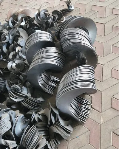 Close-up of polished steel screw flights